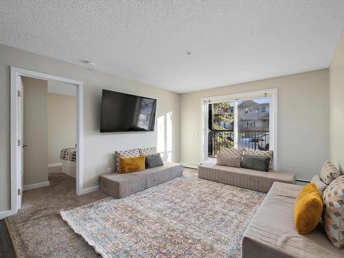 109 14808 125 Street, Edmonton, AB - Indoor Photo Showing Living Room