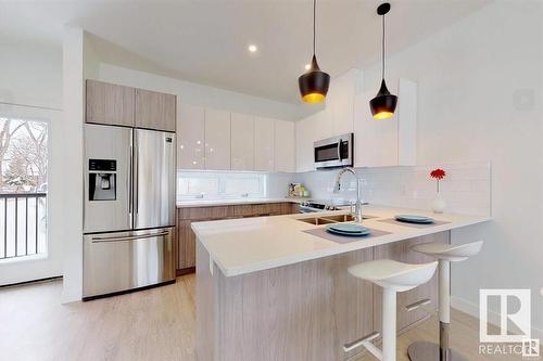 12903 107 Avenue, Edmonton, AB - Indoor Photo Showing Kitchen With Stainless Steel Kitchen With Double Sink With Upgraded Kitchen