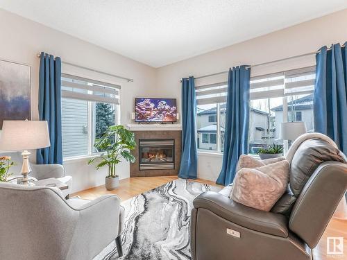 49 2508 Hanna Crescent, Edmonton, AB - Indoor Photo Showing Living Room With Fireplace