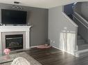 127 Ward Crescent, Edmonton, AB  - Indoor Photo Showing Living Room With Fireplace 