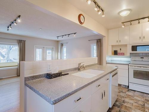 Edmonton, AB - Indoor Photo Showing Kitchen With Double Sink