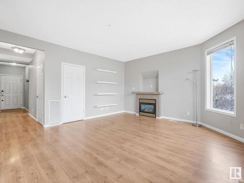 303 8108 109 Street, Edmonton, AB - Indoor With Fireplace