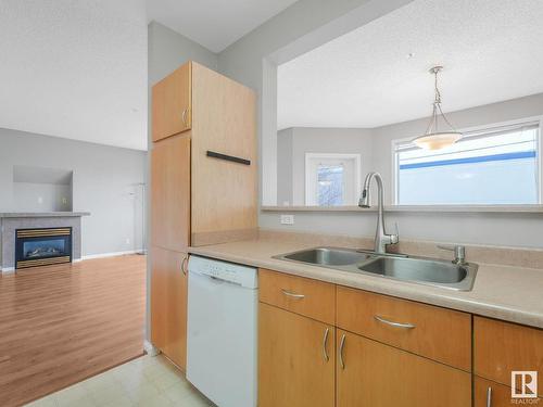 303 8108 109 Street, Edmonton, AB - Indoor Photo Showing Kitchen With Double Sink