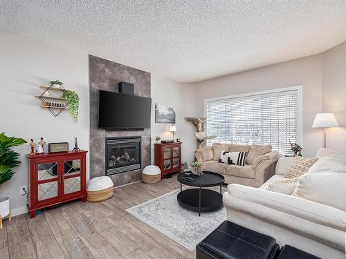 8120 224 Street, Edmonton, AB - Indoor Photo Showing Living Room With Fireplace