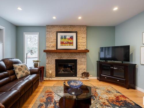 11036 10 Avenue, Edmonton, AB - Indoor Photo Showing Living Room With Fireplace