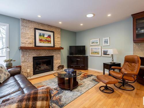 11036 10 Avenue, Edmonton, AB - Indoor Photo Showing Living Room With Fireplace