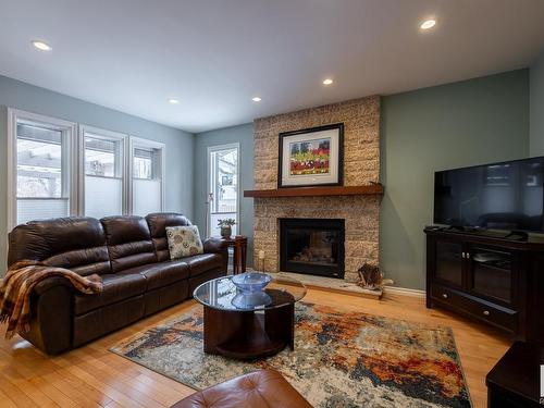 11036 10 Avenue, Edmonton, AB - Indoor Photo Showing Living Room With Fireplace