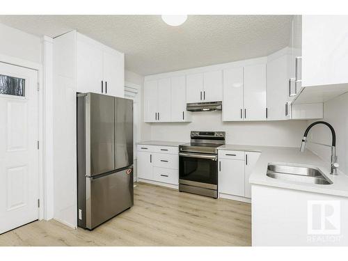 9937 88 Avenue, Edmonton, AB - Indoor Photo Showing Kitchen With Double Sink