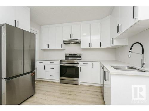 9937 88 Avenue, Edmonton, AB - Indoor Photo Showing Kitchen With Double Sink