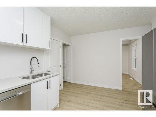 9937 88 Avenue, Edmonton, AB - Indoor Photo Showing Kitchen With Double Sink