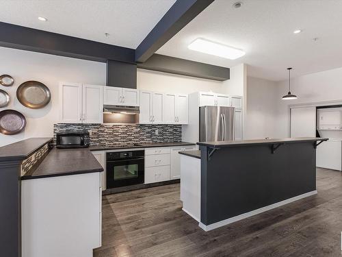 306 9804 101 Street, Edmonton, AB - Indoor Photo Showing Kitchen With Upgraded Kitchen