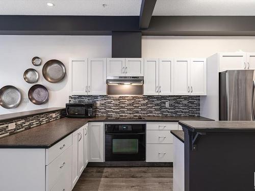 306 9804 101 Street, Edmonton, AB - Indoor Photo Showing Kitchen