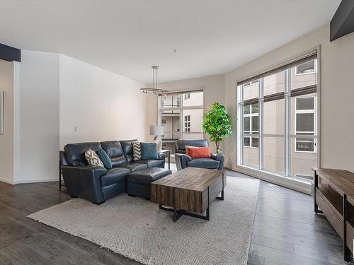 306 9804 101 Street, Edmonton, AB - Indoor Photo Showing Living Room