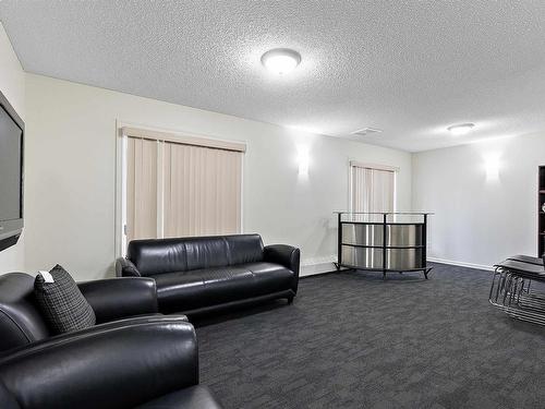 311 15211 139 Street, Edmonton, AB - Indoor Photo Showing Living Room