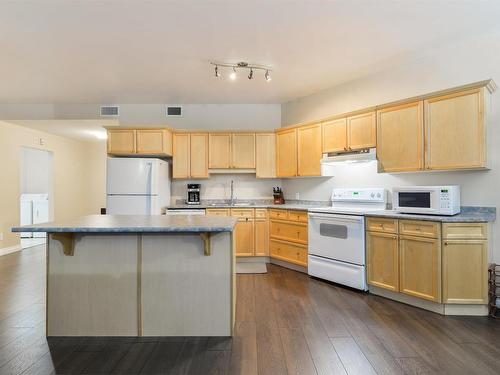 Edmonton, AB - Indoor Photo Showing Kitchen