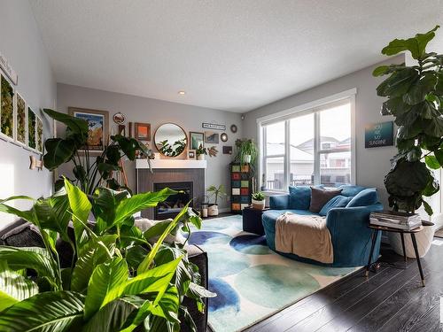 8611 Summerside Grande Boulevard, Edmonton, AB - Indoor Photo Showing Living Room With Fireplace