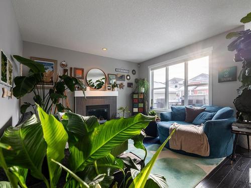 8611 Summerside Grande Boulevard, Edmonton, AB - Indoor Photo Showing Living Room With Fireplace