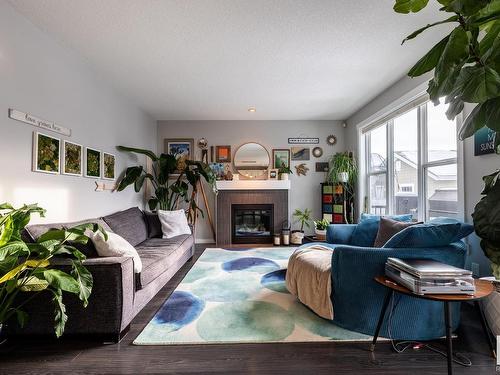 8611 Summerside Grande Boulevard, Edmonton, AB - Indoor Photo Showing Living Room With Fireplace