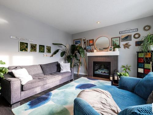 8611 Summerside Grande Boulevard, Edmonton, AB - Indoor Photo Showing Living Room With Fireplace