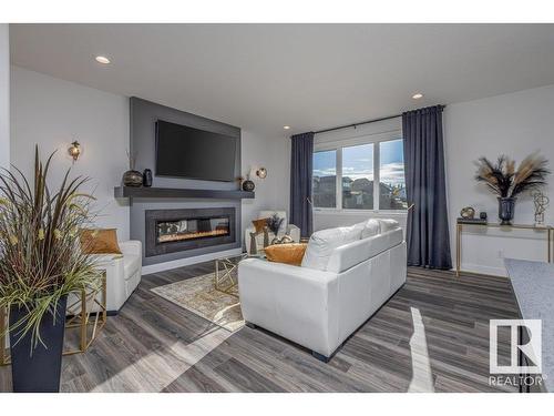 4 Hull Wynd, Spruce Grove, AB - Indoor Photo Showing Living Room With Fireplace