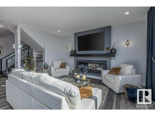 4 Hull Wynd, Spruce Grove, AB - Indoor Photo Showing Living Room With Fireplace