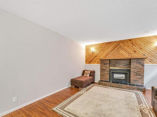 6416 11 Avenue, Edmonton, AB - Indoor Photo Showing Other Room With Fireplace