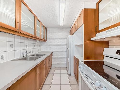 111 Woodstock, Edmonton, AB - Indoor Photo Showing Kitchen With Double Sink