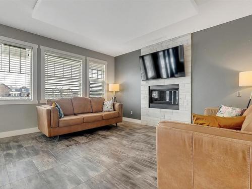 3578 Cherry Landing, Edmonton, AB - Indoor Photo Showing Living Room With Fireplace