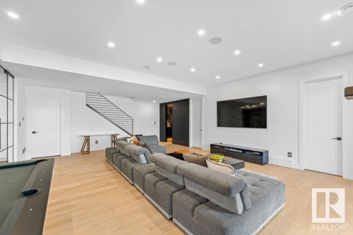 4081 Whispering River Drive, Edmonton, AB - Indoor Photo Showing Living Room With Fireplace