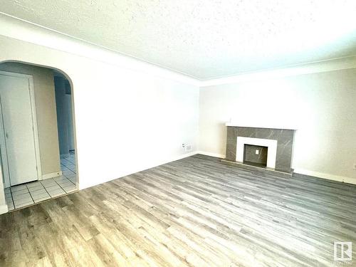 12427 96 Street, Edmonton, AB - Indoor With Fireplace