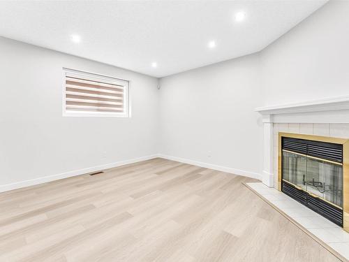 525 Jellett Way, Edmonton, AB - Indoor Photo Showing Other Room With Fireplace