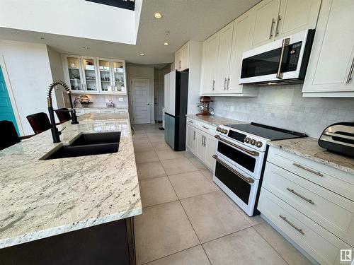 406 1350 Windermere Way, Edmonton, AB - Indoor Photo Showing Kitchen With Double Sink With Upgraded Kitchen