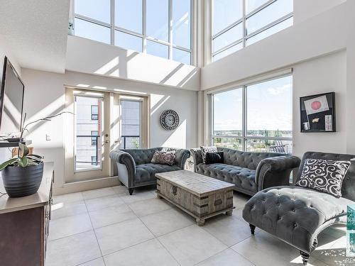 406 1350 Windermere Way, Edmonton, AB - Indoor Photo Showing Living Room