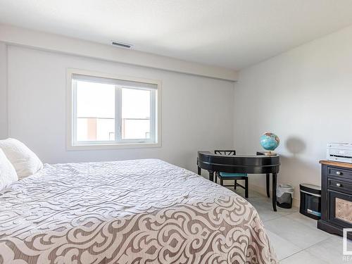 406 1350 Windermere Way, Edmonton, AB - Indoor Photo Showing Bedroom