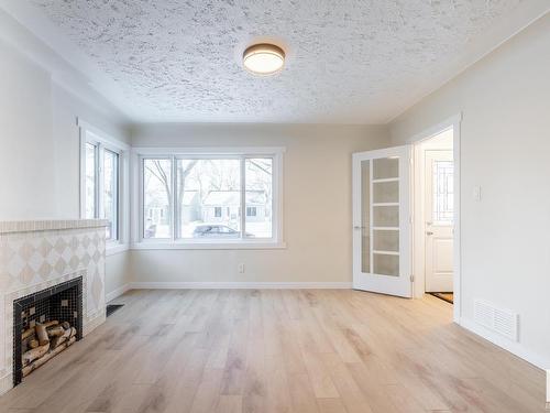 10819 92 Street, Edmonton, AB - Indoor Photo Showing Other Room With Fireplace