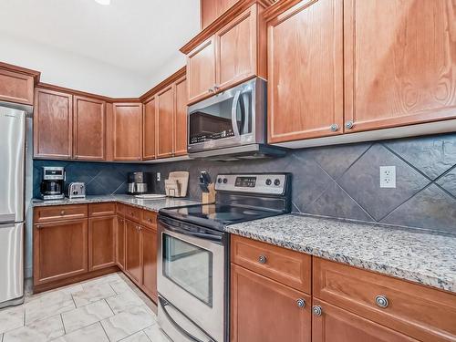 79 13825 155 Avenue Nw, Edmonton, AB - Indoor Photo Showing Kitchen With Stainless Steel Kitchen