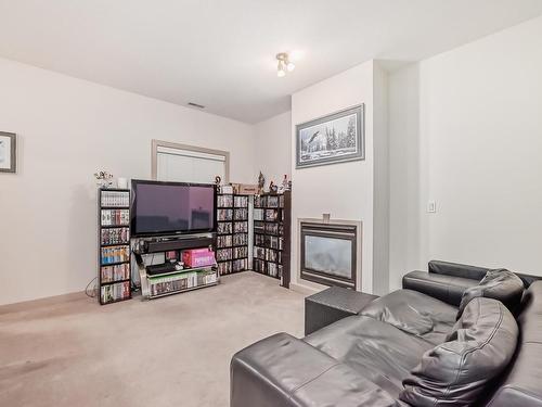 79 13825 155 Avenue Nw, Edmonton, AB - Indoor Photo Showing Living Room With Fireplace