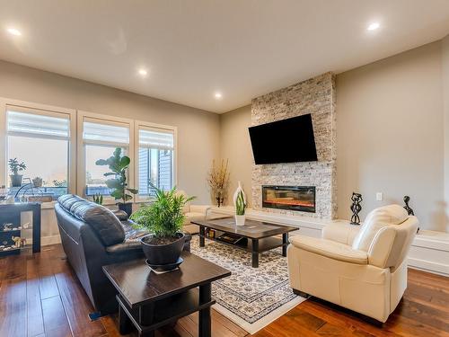 3036 58 Avenue Ne, Rural Leduc County, AB - Indoor Photo Showing Living Room With Fireplace