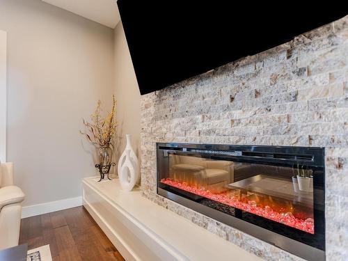 3036 58 Avenue Ne, Rural Leduc County, AB - Indoor Photo Showing Living Room With Fireplace