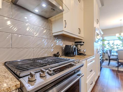 3036 58 Avenue Ne, Rural Leduc County, AB - Indoor Photo Showing Kitchen With Upgraded Kitchen