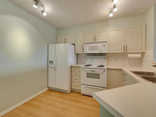 414 11716 100 Avenue, Edmonton, AB - Indoor Photo Showing Kitchen With Double Sink