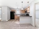 301 11453 Ellerslie Road, Edmonton, AB  - Indoor Photo Showing Kitchen With Double Sink 