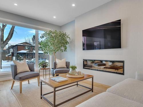 9511 70 Avenue, Edmonton, AB - Indoor Photo Showing Living Room With Fireplace