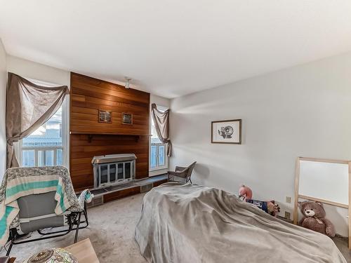 55 1415 62 Street, Edmonton, AB - Indoor Photo Showing Bedroom With Fireplace