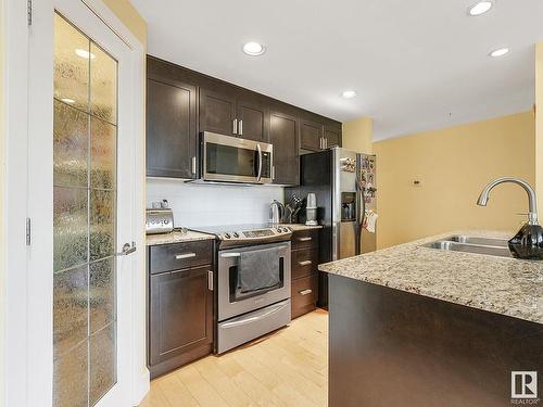 301 10028 119 Street, Edmonton, AB - Indoor Photo Showing Kitchen With Stainless Steel Kitchen With Double Sink With Upgraded Kitchen