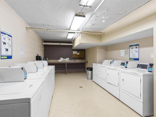 307 9028 Jasper Avenue, Edmonton, AB - Indoor Photo Showing Laundry Room