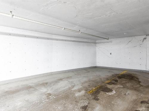 307 9028 Jasper Avenue, Edmonton, AB - Indoor Photo Showing Garage