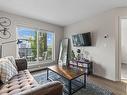 303 5521 7 Avenue, Edmonton, AB  - Indoor Photo Showing Living Room 