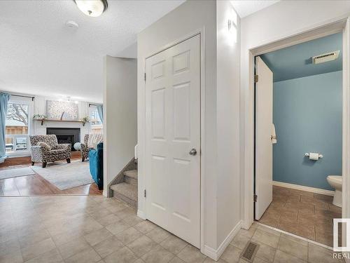 3623 30 Avenue, Edmonton, AB - Indoor Photo Showing Other Room With Fireplace