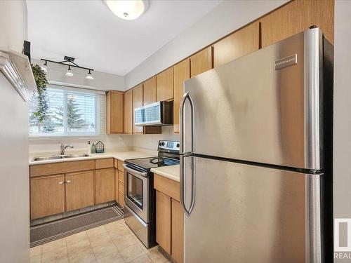 3623 30 Avenue, Edmonton, AB - Indoor Photo Showing Kitchen With Double Sink